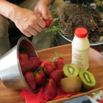 Strawberries and cream with a side of soil.