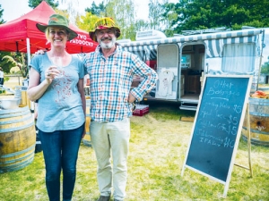 Two Paddocks GM Jacqui Murphy and Sam Neill toast the pop-up cellar door.