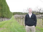 MyFarm national sales manager Grant Payton at the existing kiwifruit orchard which will form part of a new venture just south of Auckland.