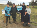 Synlait’s top milk supplier Kieran McCall (standing second from right) with his team.