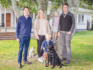 Maddy and Andrew McLean with children Olivia and Oscar, alongside ANZ relationship manager Henry Tietjen (left).