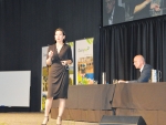 Fonterra executive Jacqueline Chow addresses farmers at the recent DairyNZ Farmers Forum while chief executive Theo Spierings looks on.