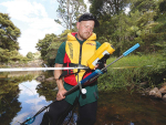 Northland Regional Council hydrology monitoring officer Marcus Schlesier gauging flow rates in the Kerikeri area.