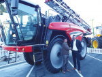 Dorie farmer John Evans takes possession of his new iXdrive, 4180 self-propelled sprayer from Erik Hogervorst of Kverneland.