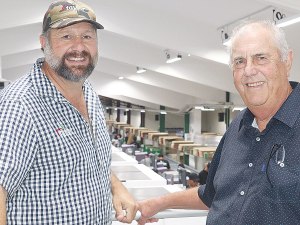 Kelvin Taylor (right) and son Cameron inside their new packhouse in Hawke’s Bay.