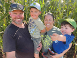 Amber Carpenter, husband Fraser and children Oliver and Noah on the farm.