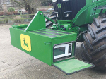Paul Spinks has incorporated a 600W microwave and a travel kettle into the linkage-mounted front weight block on his John Deere tractor.