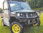 A Gator light utility vehicle made from recyclable materials.
