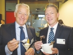 Landcorp general manager commercial Andrew MacPherson and chief executive Steven Carden sample the company’s produce.