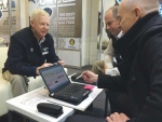 Colin Templeton (left) and Kim Johnstone (centre) of GrainCorp Feeds, and Ken Winter (right) of Dairy Club at National Fieldays.