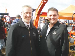 Outgoing TAMA president Ian Massicks (left) hands over the reins to Mark Hamilton-Manns.