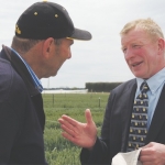 UK agronomist Patrick Stephenson with local grower.