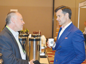 Lino Saputo Junior (right) chats with Richard Lange, Milk2Market at the Australian Dairy Conference..