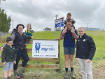 Farm Source director Richard Allen (right) with the Moore family.