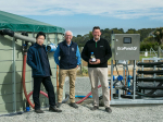 Lincoln University professors Hong Di, left, and Keith Cameron with Ravensdown&#039;s Carl Ahfield. The team responsible for the Cleartech effluent management system has now unveiled EcoPond, claimed to be a breakthrough in methane mitigation. Supplied. Tony Stewart/Photoshots