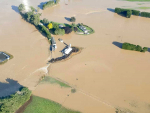 Floods are ravaging Southland-South Otago. Photo: High Country Helicopters/Facebook.