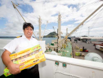 Asian Adonis captain Bernardo D. Ocampo, with part of the first shipment of kiwifruit for the season, due to leave for the Chinese market this weekend. Photo: Jamie Troughton/Dscribe Media.