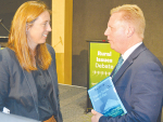 Beef+Lamb chair Kate Acland talks with National’s Todd McClay following the Rural Issues debate at Mystery Creek earlier this month.