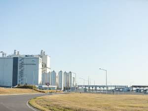 Fonterra slashes forecast milk price, again