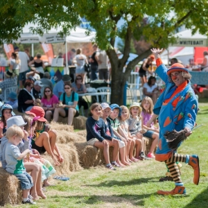 A clown entertains the children at the 2014 Show.