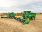 JD enhances harvesters