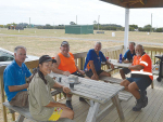 Northland field days committee members (from left) Ross Newlove, Gail Cole, Basil Cole, Shane Hanley, Ned Stevens and John Phillips take a well-earned break from marking out the Dargaville showgrounds site late last month.