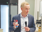 Fonterra Atlantic president Richard Allen with a protein-packed US drink during a briefing with journalists in Auckland last month.