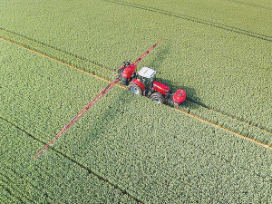 A Kverneland-mounted sprayer in action.