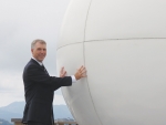 MetService chief executive Peter Lennox pictured near a weather radar.