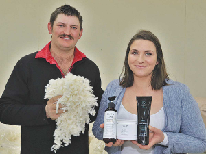 Goughs Bay sheep farmers George and Emma Masefield with wool and beauty products containing Keraplast keratin.