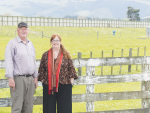 Rod McMillan and Denise Carrick in front of the fence marking the current boundary between the Lincoln urban area and farmland. The dairy pasture is part of the Carter Group’s 170ha Lincoln South subdivision, which the pair hope to stop. Photo Credit: Nigel Malthus