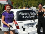 Gina Greenwood (left) with her #prodairy car.